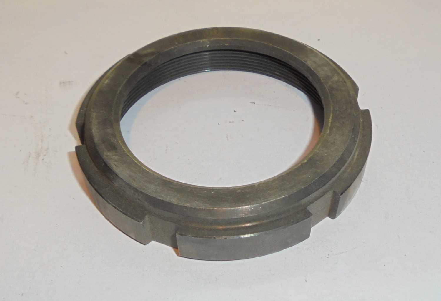 Rear axle hub nut left (right hand thread)